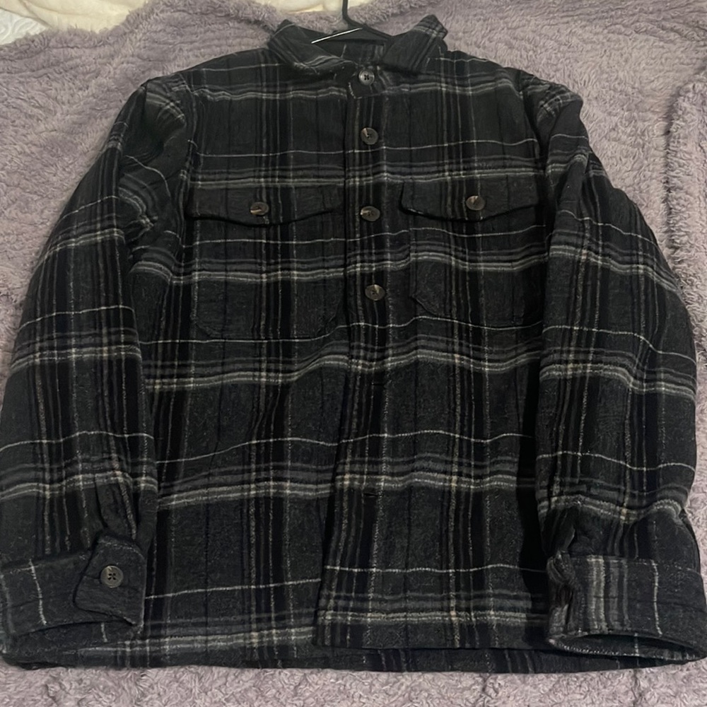 Men’s flannel jacket (not thin like a button up) very thick.